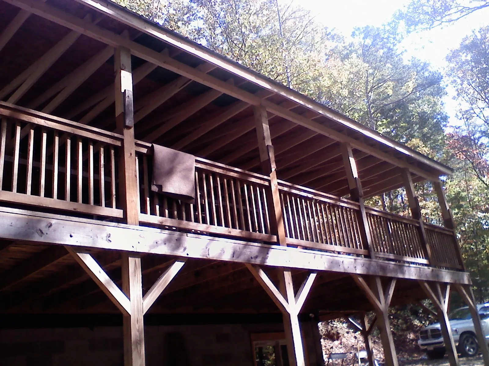 Timber framing under a new elevated porch and deck — Roof Leak Repair in Colebrook by Roofing Brothers